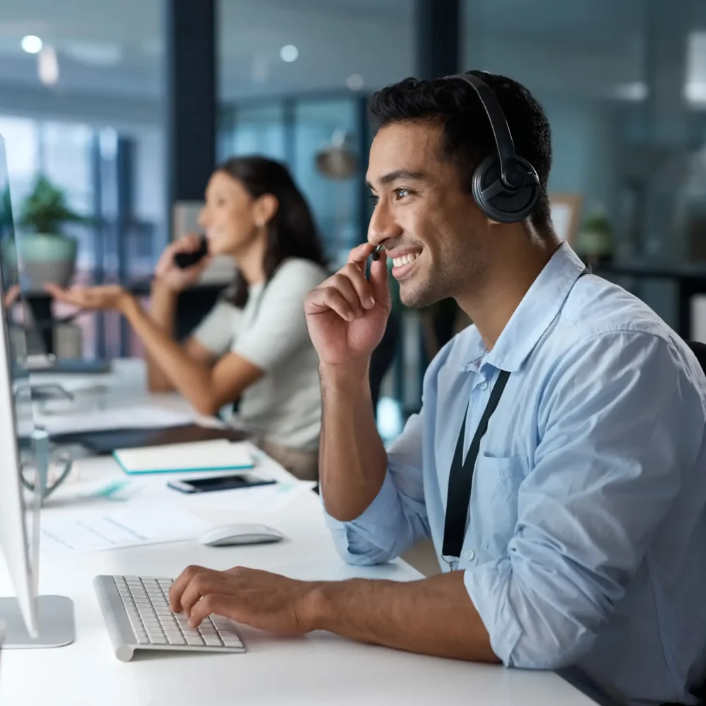 dedicated-service-creates-dedicated-customers-shot-young-man-using-headset-computer-modern-office